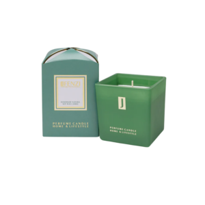 Green square candle with a white wick beside a matching teal gift box labeled 'Perfume Candle Home & Lifestyle.'